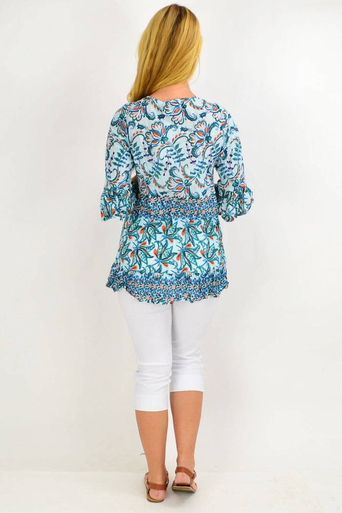 Blue and green vine print tunic top by One Summer, featuring floral petal design and relaxed fit, perfect for casual wear.