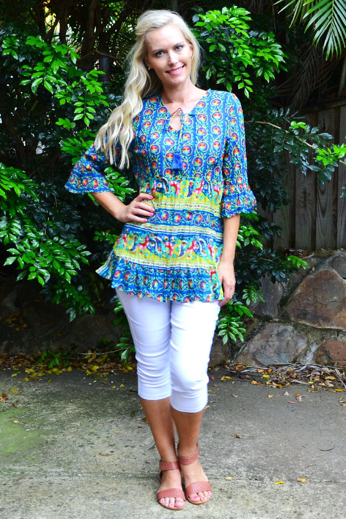 Floral lantern ruffle sleeve tunic top by One Summer, showcasing a vibrant floral pattern and stylish ruffle sleeves.