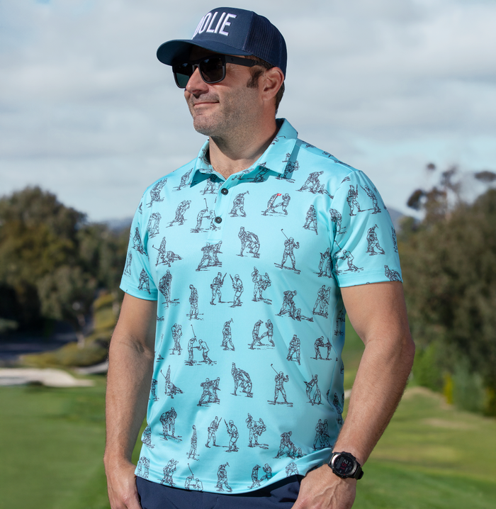 Performance Men's Golf Polo in Aqua with fighting manual spoof graphics