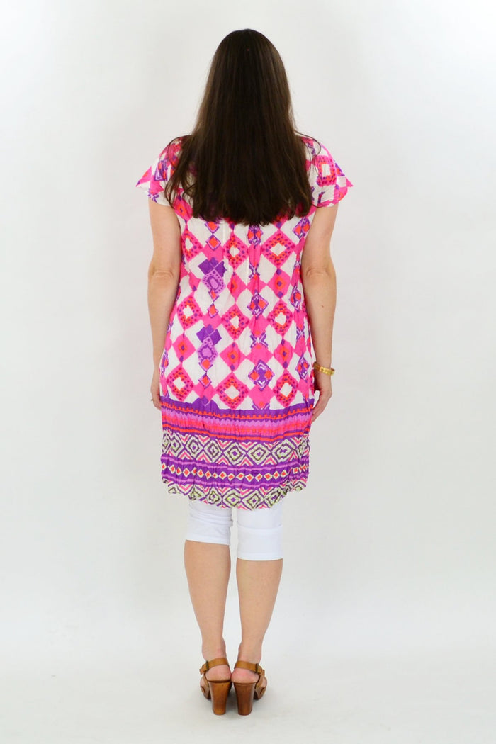 Pink Jaipur pattern tunic dress by One Summer, featuring intricate design and comfortable fit, shown on model.