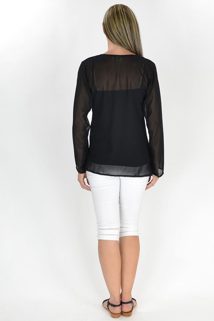 I Love Tunics Millie Tunic Top, lightweight and flowy tunic with a relaxed fit, displayed on a hanger against a neutral background.