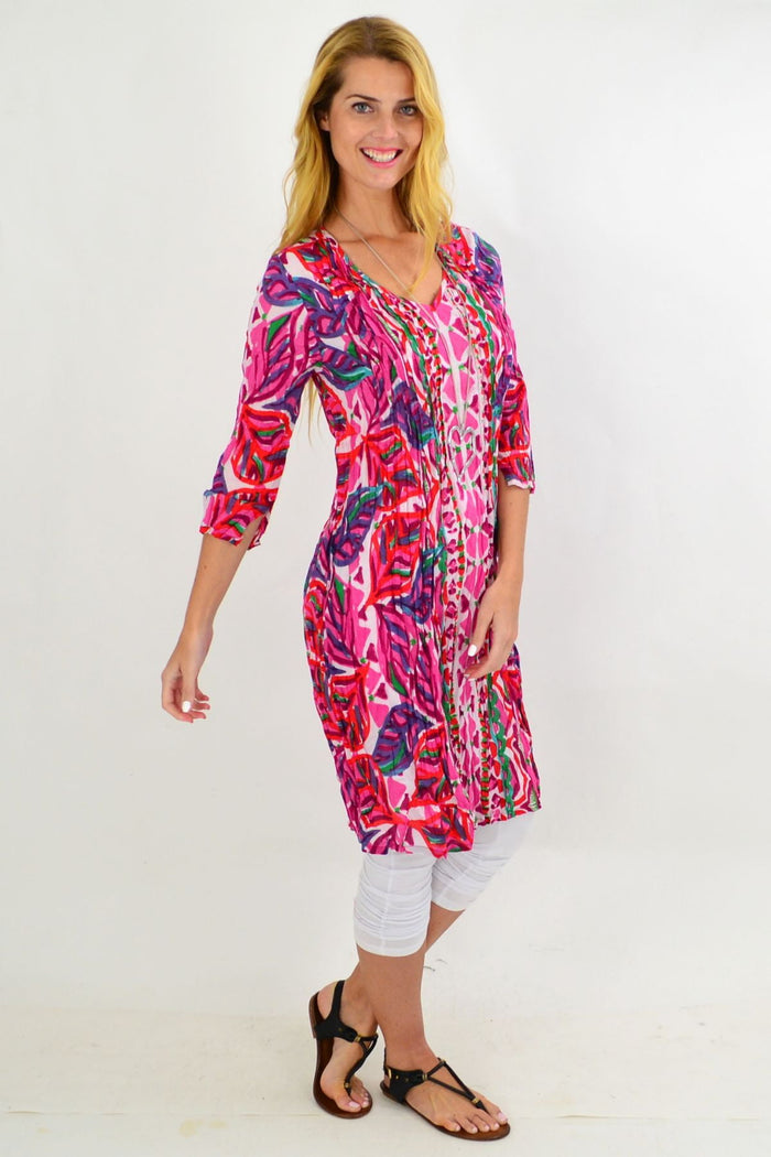 Pink patterned One Summer tunic dress with short sleeves and a relaxed fit, perfect for summer casual wear.